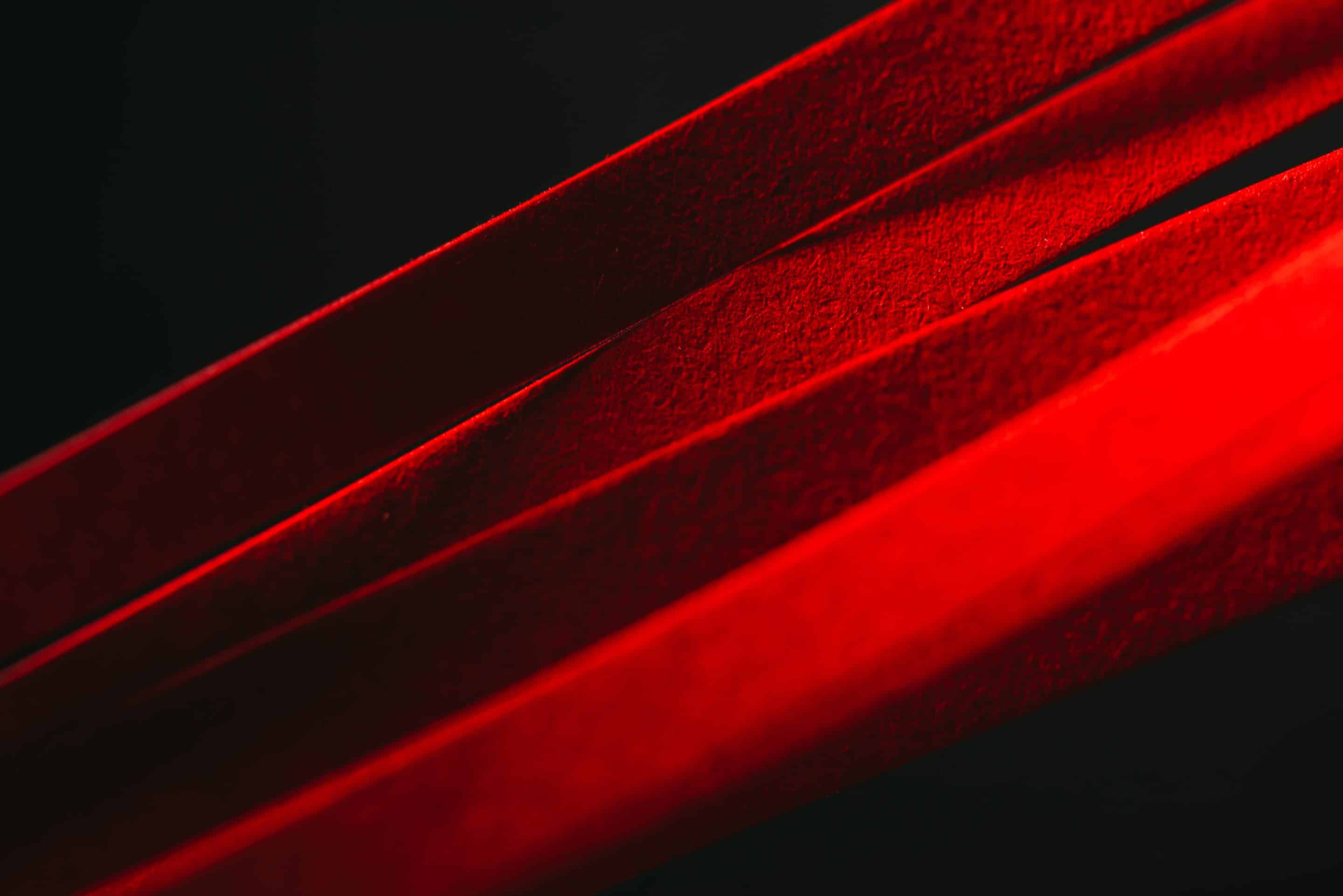 Bold red stripes with black background